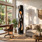 Tall Sculptural Solid Wood Floor Lamp with Open-Cut Design and Warm Ambient Lighting