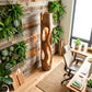 Tall Sculptural Solid Wood Floor Lamp with Open-Cut Design and Warm Ambient Lighting