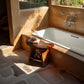 Solid Wood Bathroom Stool with Sculpted Seat and Open Shelf Storage